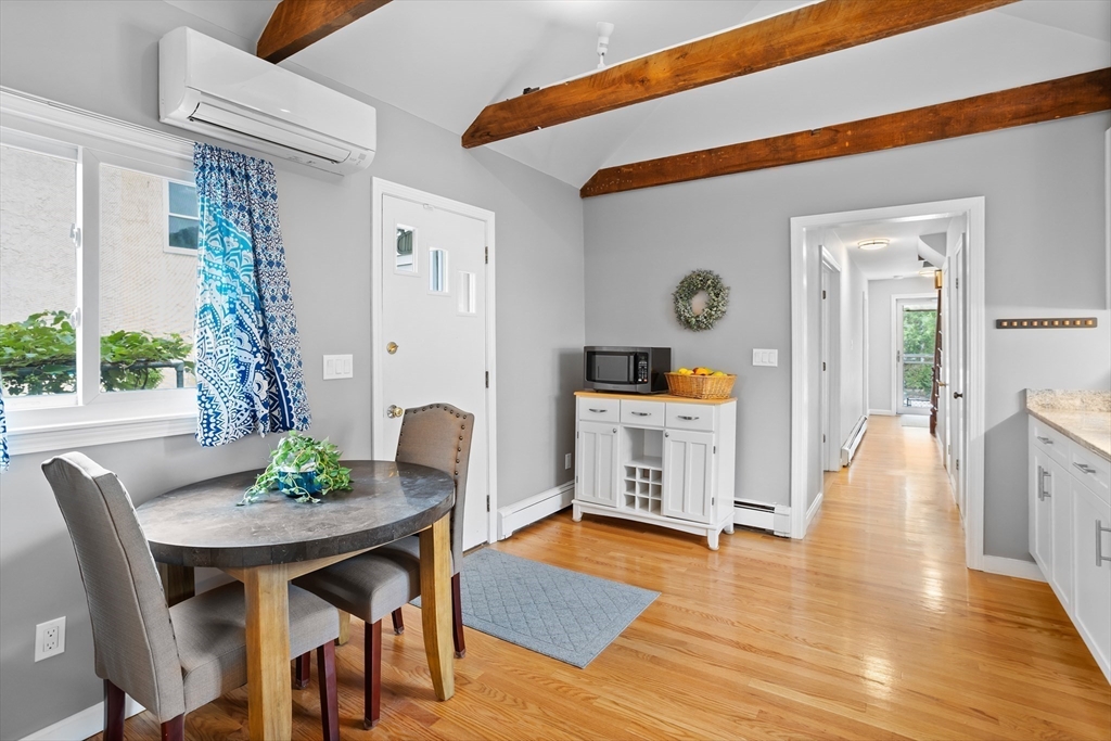 89 Prospect Street Somerville, MA 02143 - Photo 9 of 21 a living room with furniture and a table