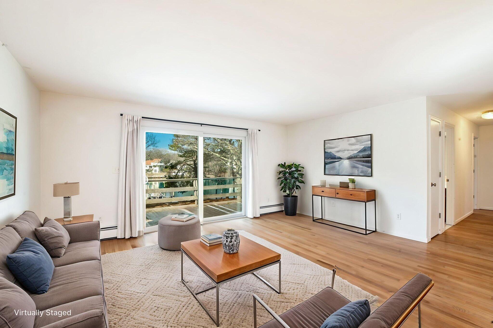 5 Rivers View Road East Falmouth, MA 02536 - Photo 17 of 44 a living room with furniture and a window