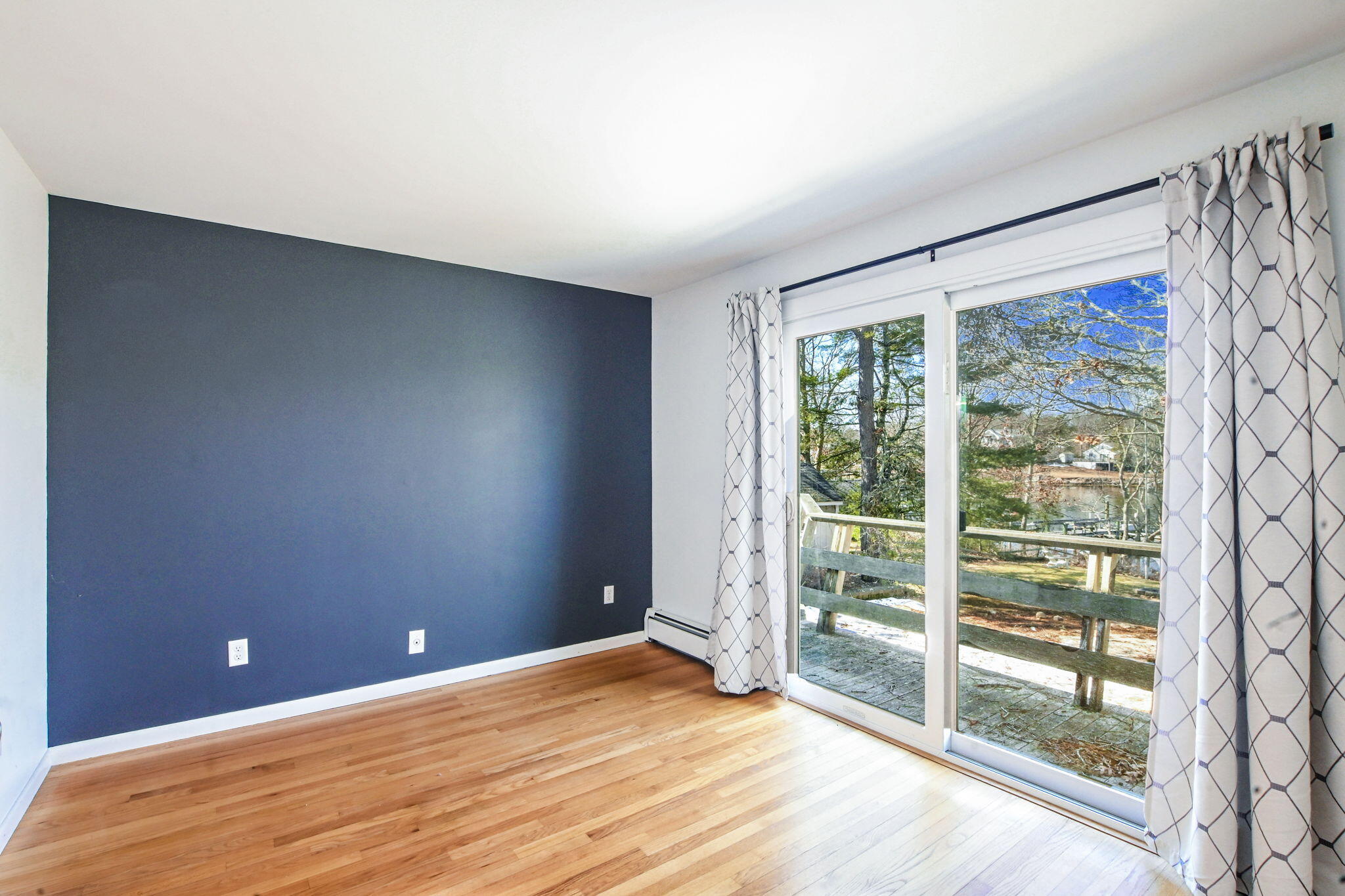 5 Rivers View Road East Falmouth, MA 02536 - Photo 28 of 44 a view of room with window and wooden floor