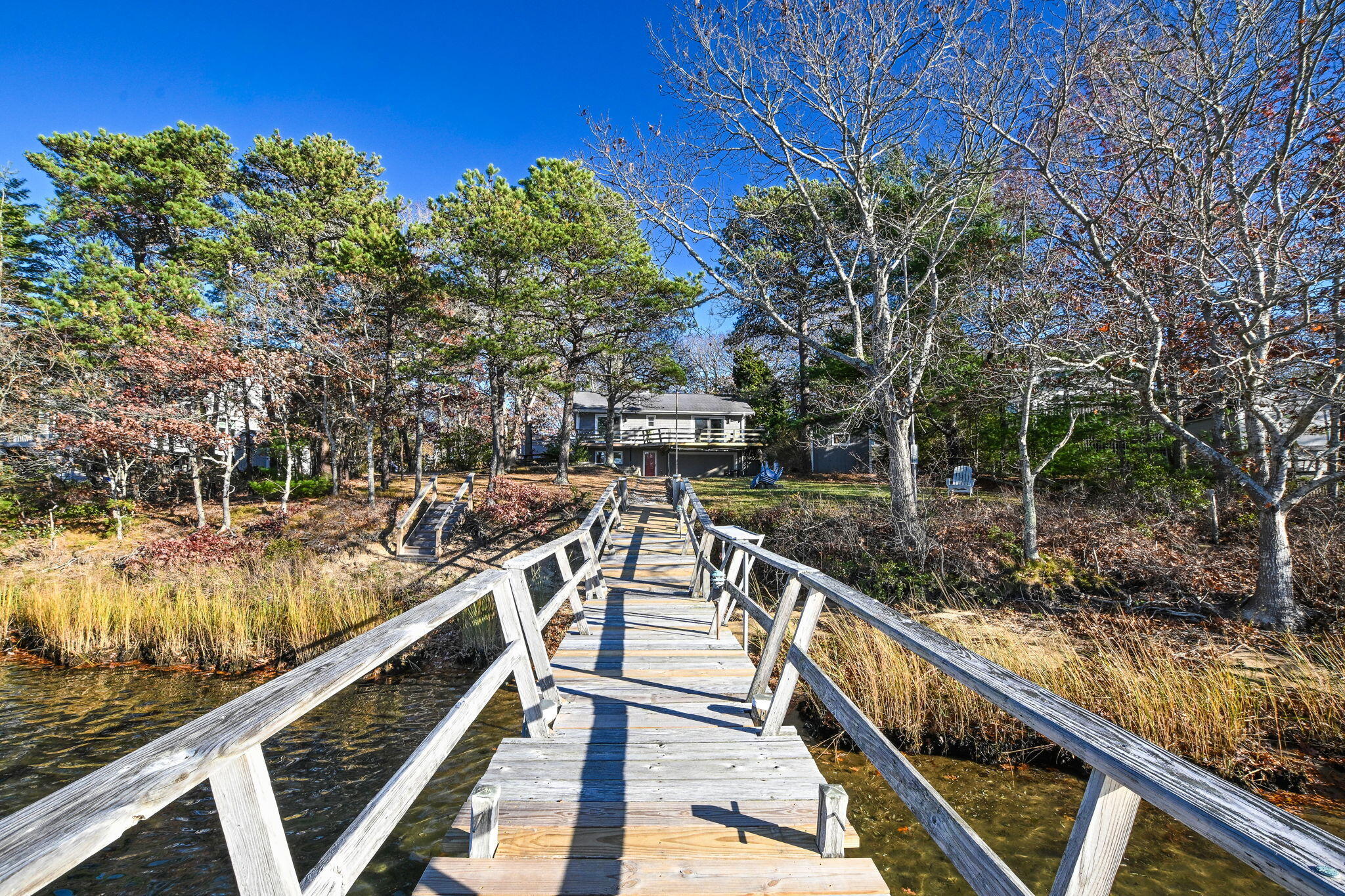 5 Rivers View Road East Falmouth, MA 02536 - Photo 8 of 44 a view of a balcony with chairs