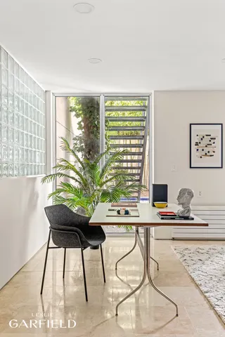 a room with furniture and window