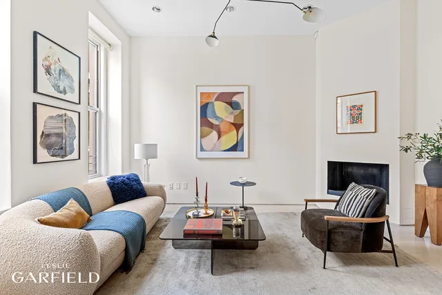 a living room with furniture and a couch