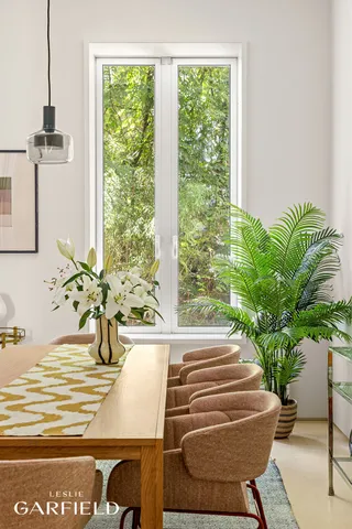 a vase of flowers sitting on a table