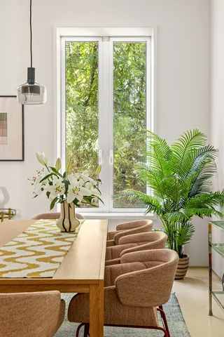 a vase of flowers sitting on a table