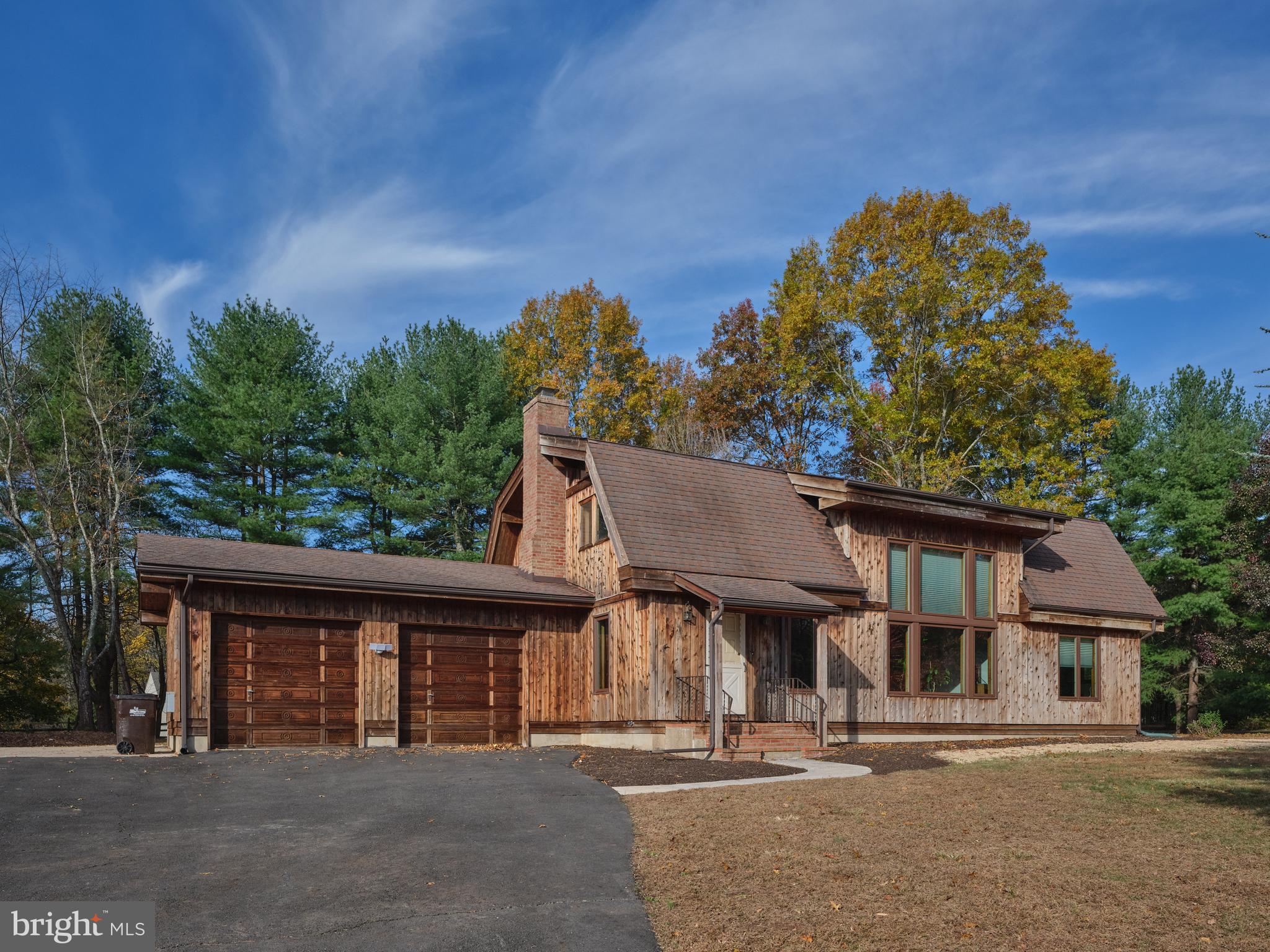 2999 Comfort Road New Hope, PA 18938 - Photo 1 of 40 a front view of a house with a garden