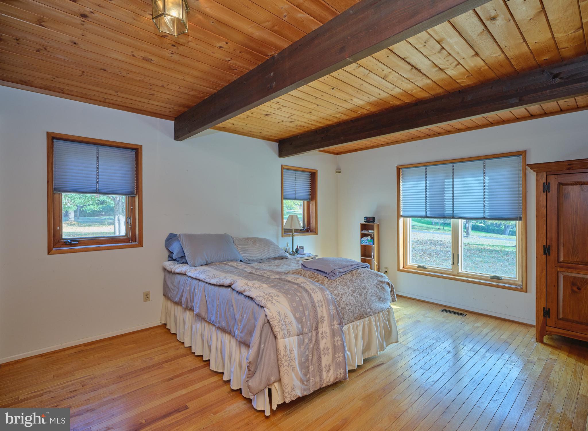 2999 Comfort Road New Hope, PA 18938 - Photo 14 of 40 a bedroom with a bed and a large window