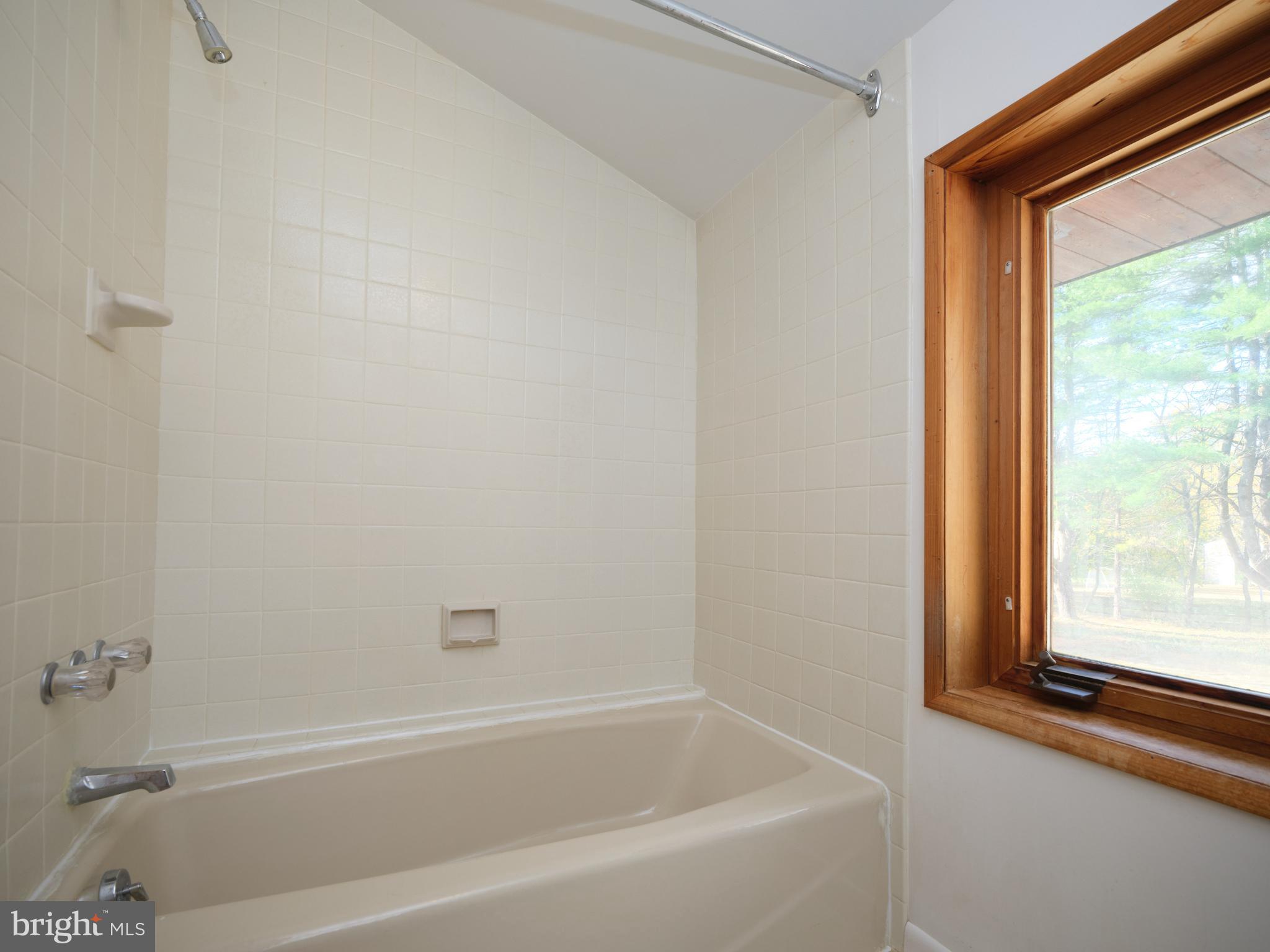 2999 Comfort Road New Hope, PA 18938 - Photo 21 of 40 a white bath tub sitting next to a window