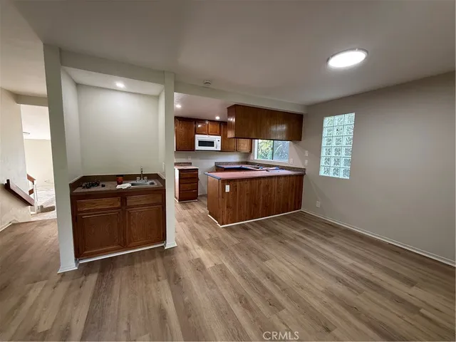 a spacious bathroom with a double vanity sink and mirror