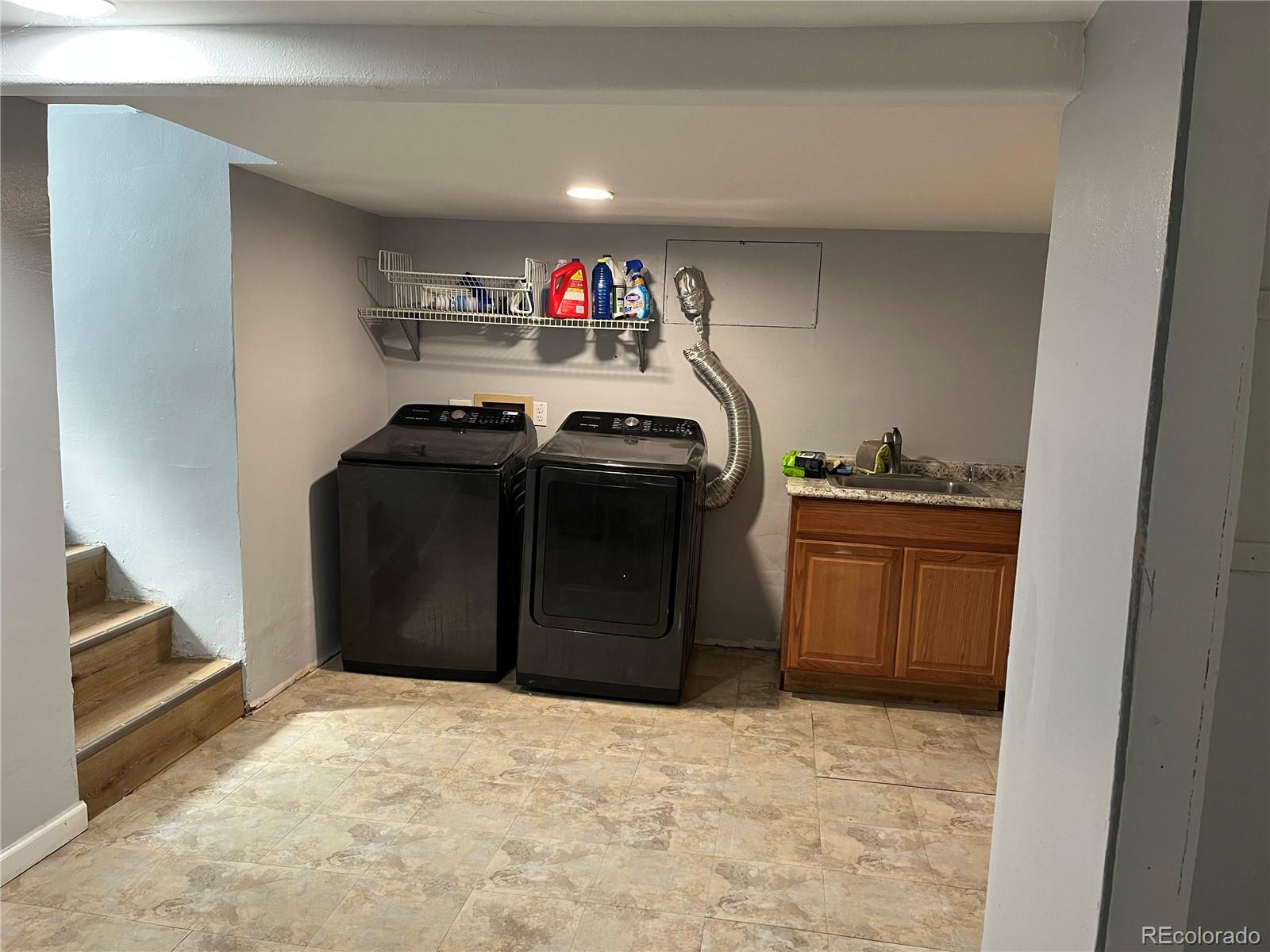 4315 Balsam Street, Unit A Wheat Ridge, CO 80033 - Photo 13 of 21 a utility room with dryer and washer