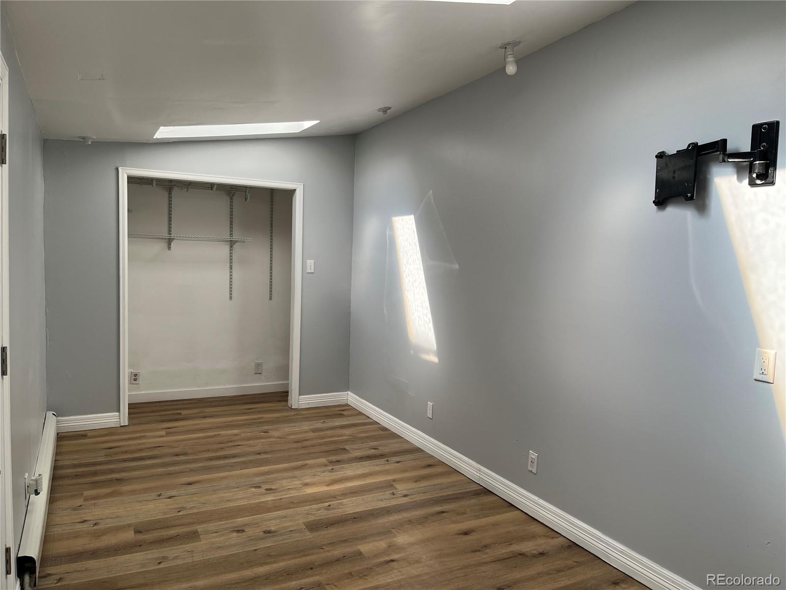 4315 Balsam Street, Unit A Wheat Ridge, CO 80033 - Photo 16 of 21 a view of an empty room