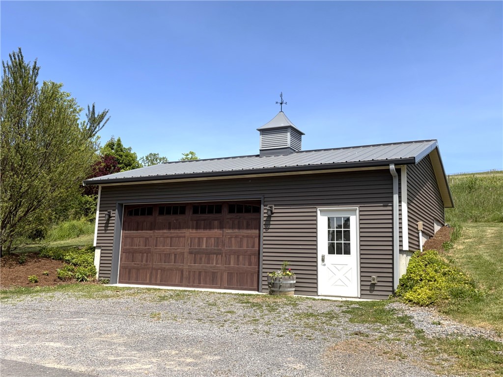 5580 Peach Orchard Road Hector, NY 14841 - Photo 6 of 50 Detached two car garage with electric