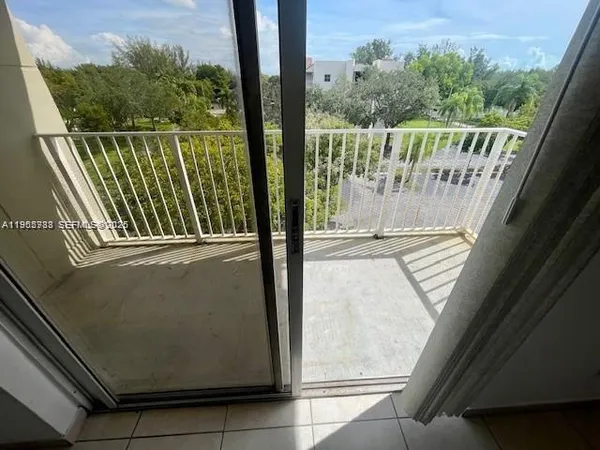 a view of a balcony with chair