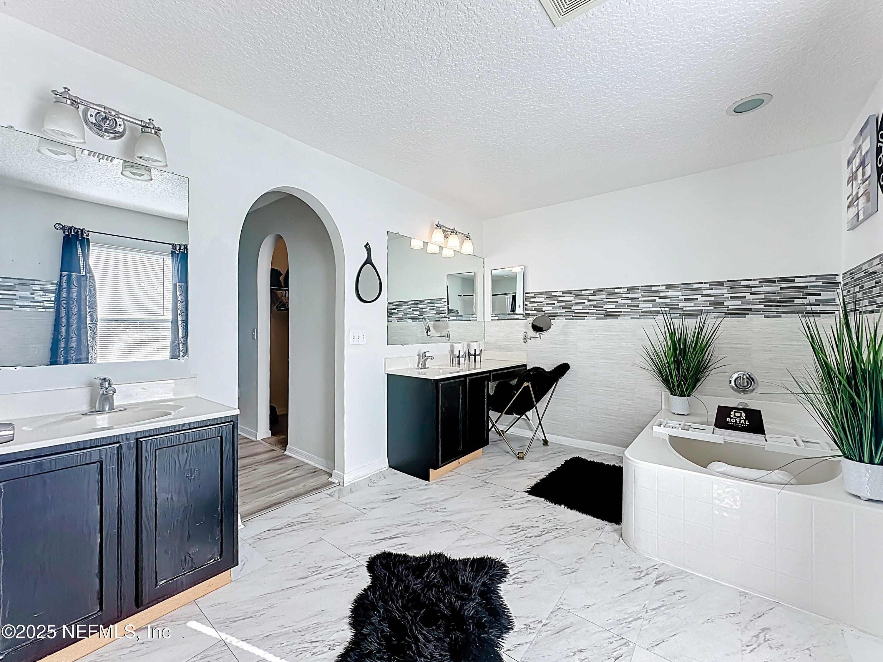 11939 Iron Creek Road Jacksonville, FL 32218 - Photo 54 of 73 a living room with furniture and a large window