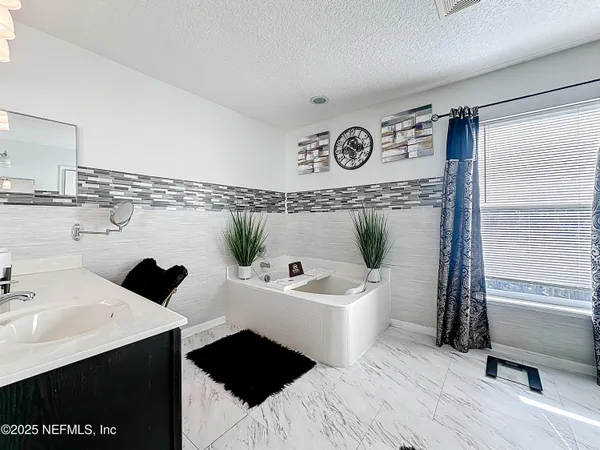 $469,000 | 11939 Iron Creek Road, Jacksonville, FL 32218