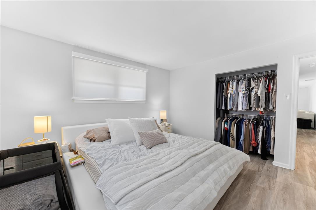 7290 Heather Road Macungie, PA 18062 - Photo 28 of 39 Clean lines and a functional open closet define this well-lit sleeping area.