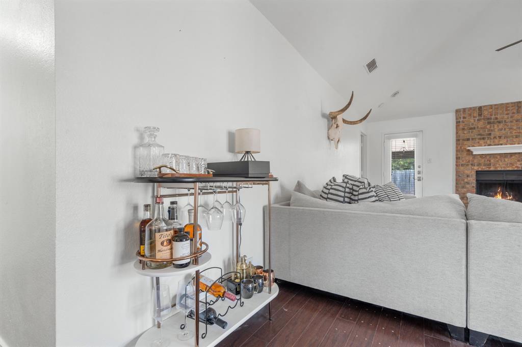 604 Lionel Way Fort Worth, TX 76108 - Photo 12 of 36 a living room with furniture and a wooden floor