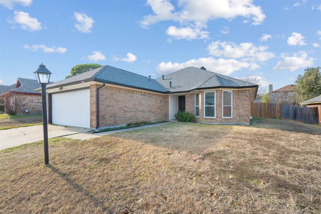 604 Lionel Way Fort Worth, TX 76108 - Photo 33 of 36 a view of a house with a yard and garage