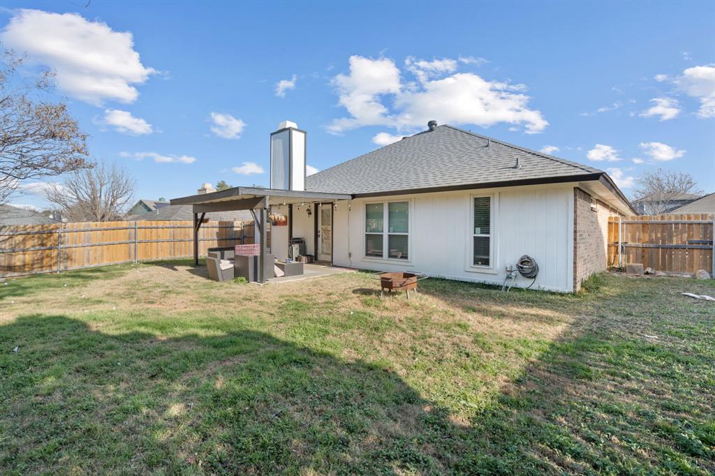 604 Lionel Way Fort Worth, TX 76108 - Photo 34 of 36 a view of a house with backyard and sitting area