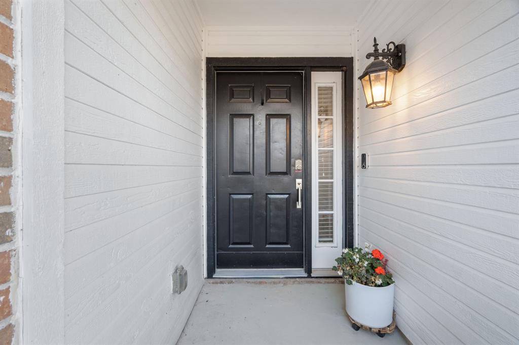 604 Lionel Way Fort Worth, TX 76108 - Photo 5 of 36 a view of a entryway door of the house