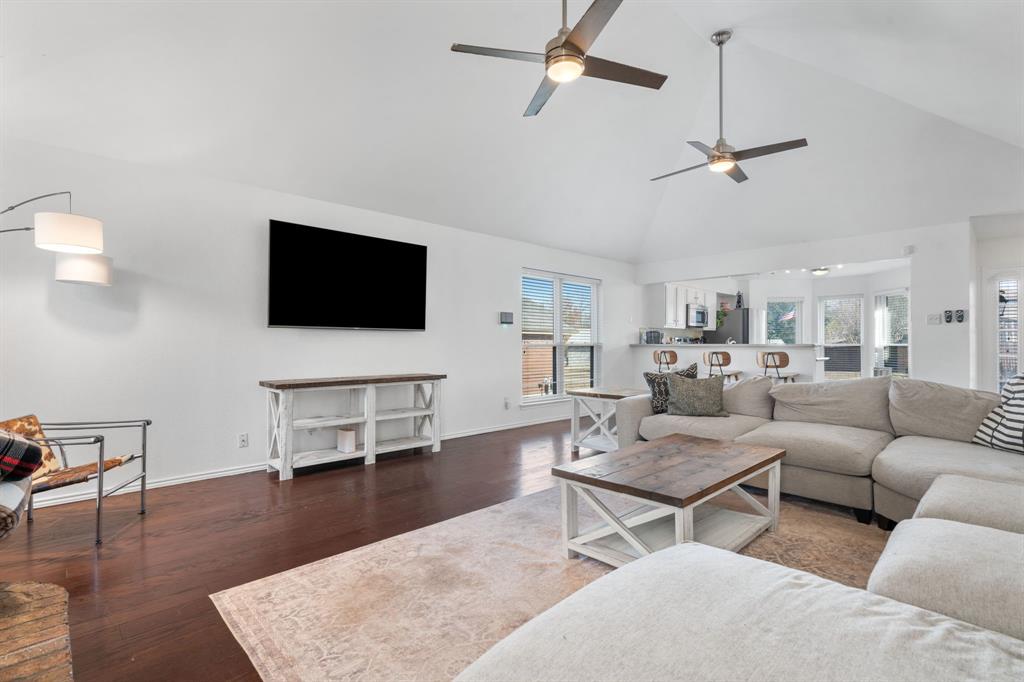 604 Lionel Way Fort Worth, TX 76108 - Photo 8 of 36 a living room with furniture and a flat screen tv