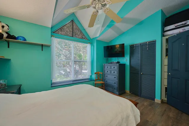 a bathroom with a sink vanity and mirror