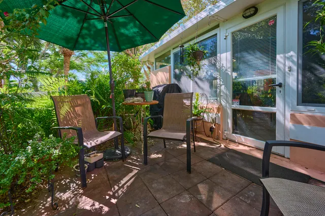 a view of yard with patio