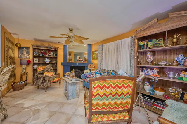 a bathroom with a sink a vanity and a tub