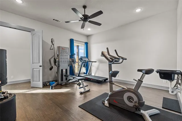a view of a hallway view with staircase