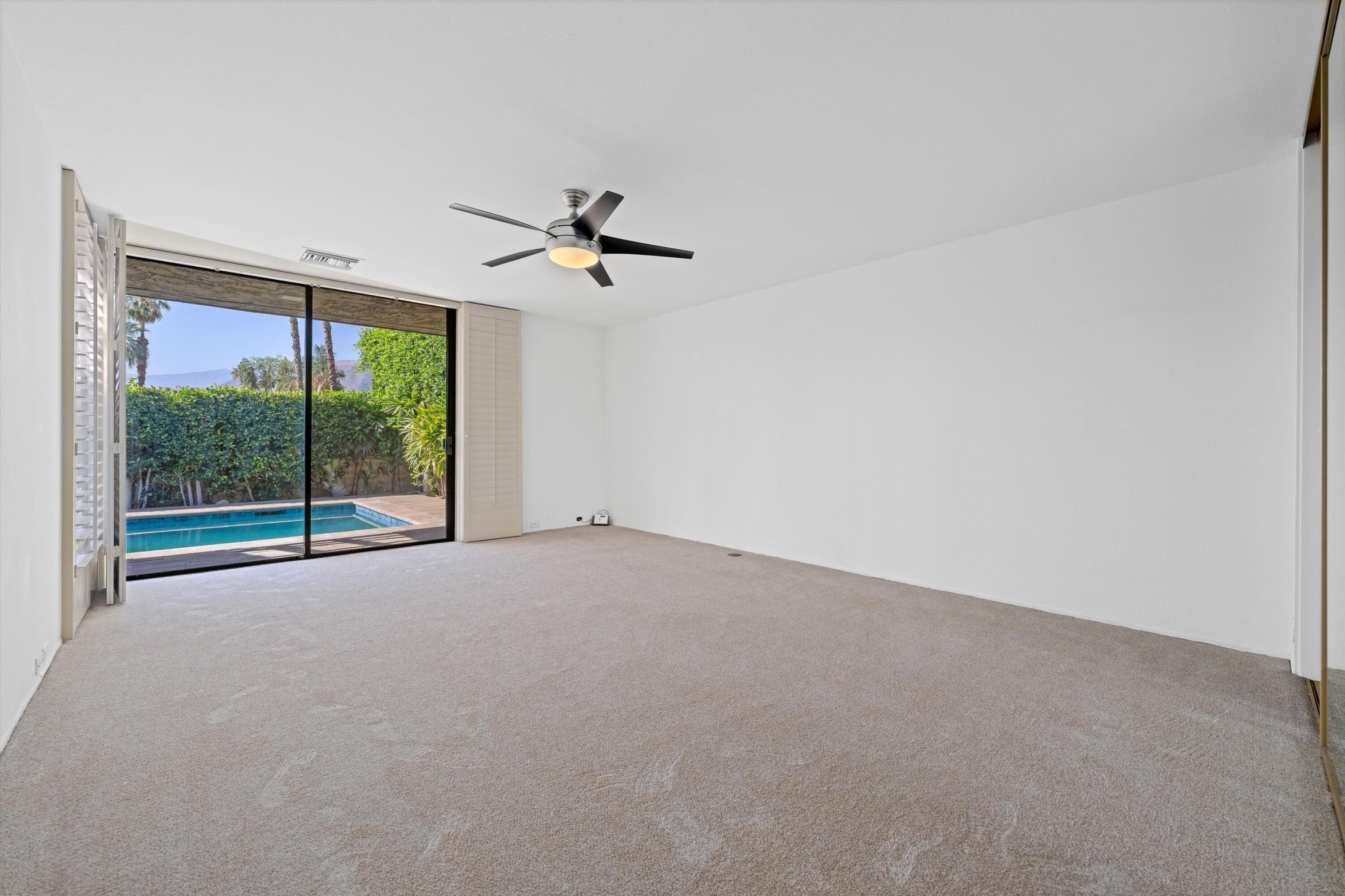 75 Colgate Drive Rancho Mirage, CA 92270 - Photo 18 of 40 a view of an empty room with windows
