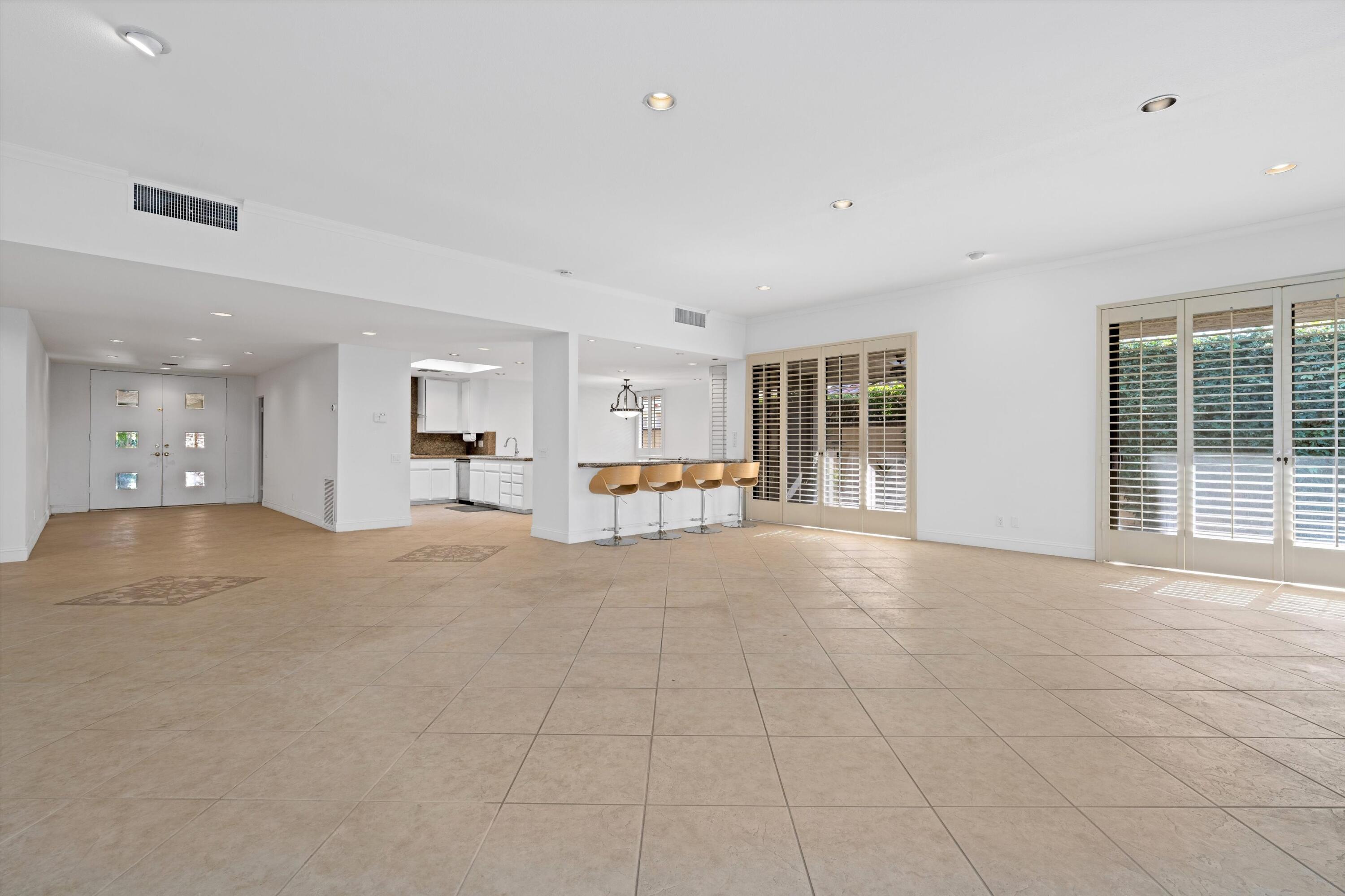 75 Colgate Drive Rancho Mirage, CA 92270 - Photo 10 of 40 a view of an empty room with a window