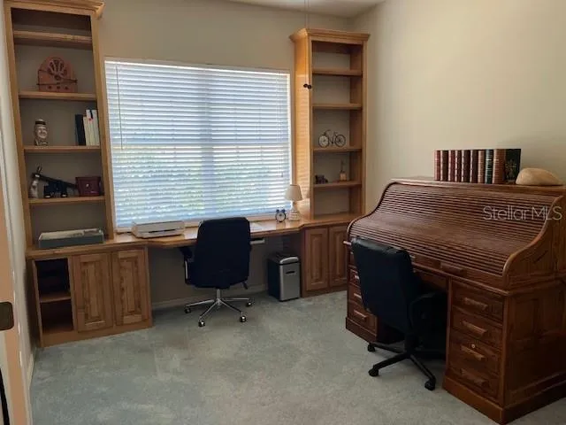 a view of lake with mountain in the back