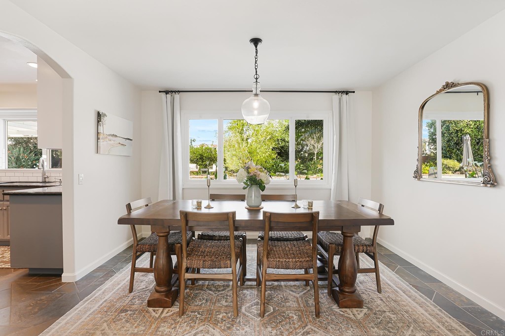 4966 Park Drive Carlsbad, CA 92008 - Photo 11 of 45 a view of a dining room with furniture window and outside view