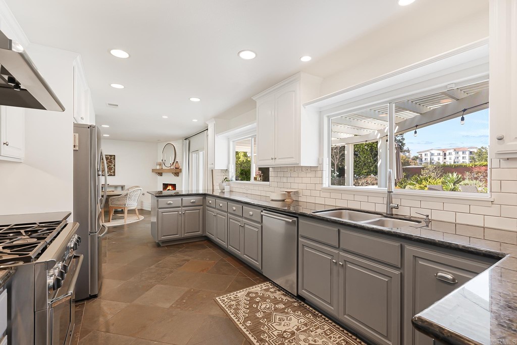 4966 Park Drive Carlsbad, CA 92008 - Photo 13 of 45 a kitchen with lots of counter top space and appliances