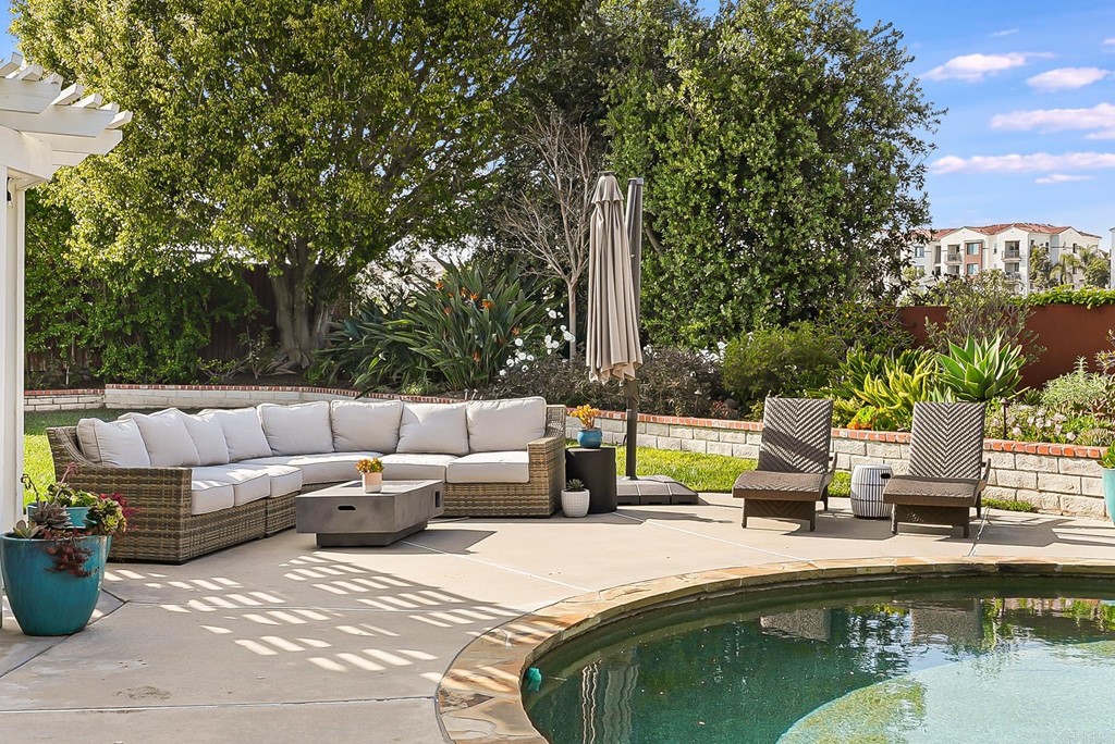 4966 Park Drive Carlsbad, CA 92008 - Photo 37 of 45 a view of swimming pool with outdoor seating