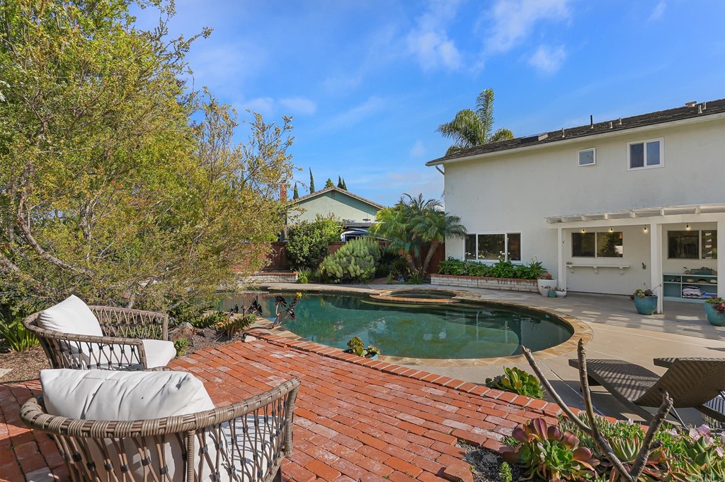 4966 Park Drive Carlsbad, CA 92008 - Photo 41 of 45 a view of a swimming pool with a patio