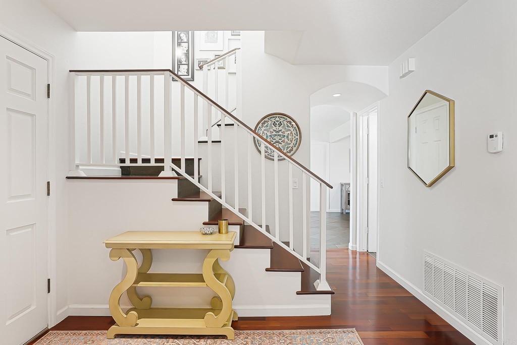 4966 Park Drive Carlsbad, CA 92008 - Photo 5 of 45 a view of entryway and hall with wooden floor