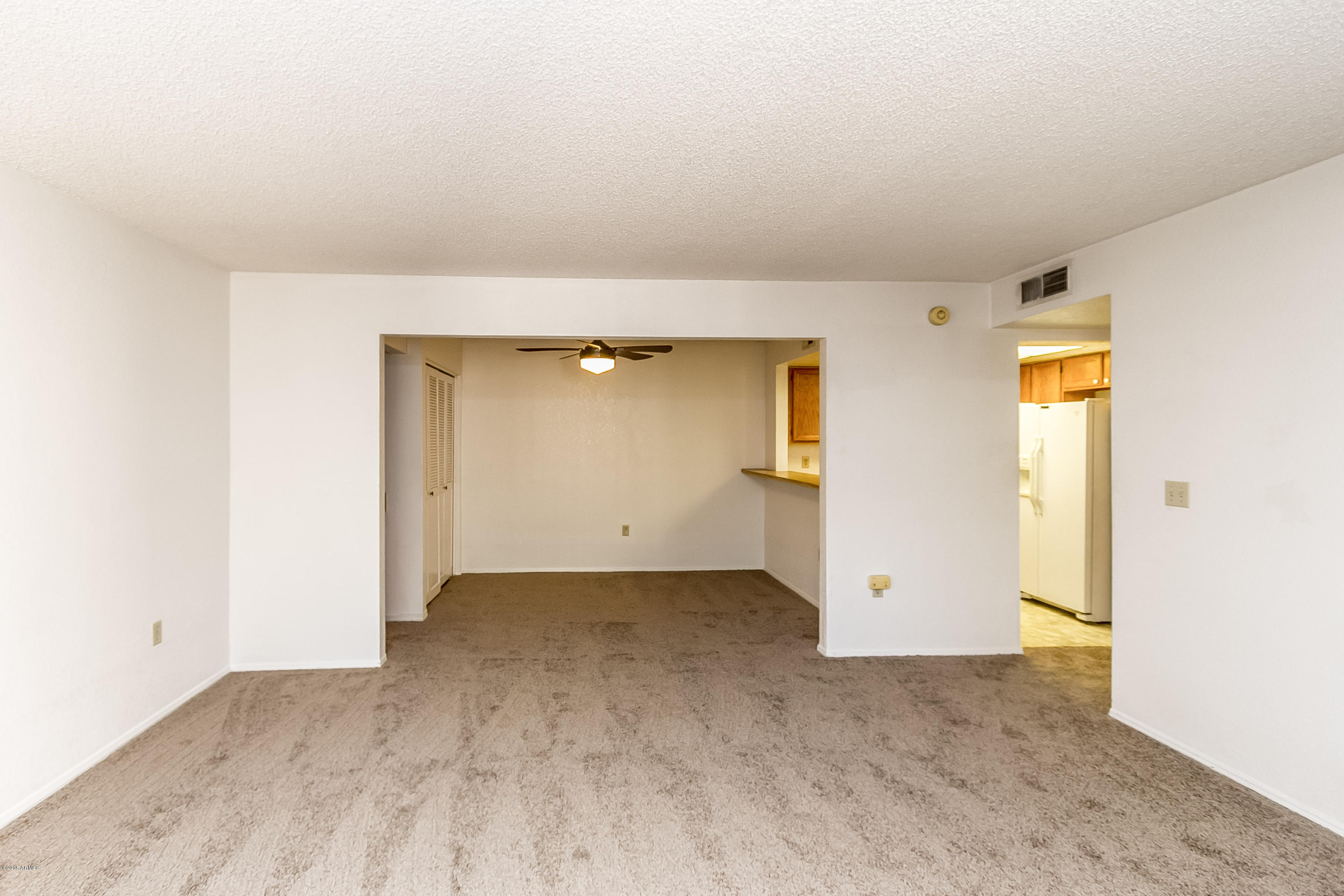1645 West Baseline Road, Unit 1160 Mesa, AZ 85202 - Photo 14 of 27 an empty room with closet