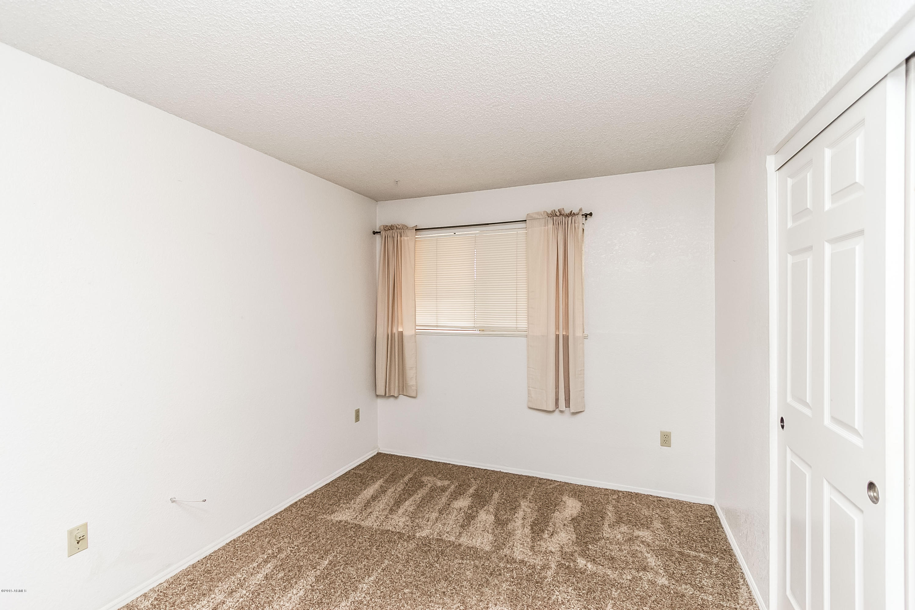 1645 West Baseline Road, Unit 1160 Mesa, AZ 85202 - Photo 20 of 27 a view of an empty room