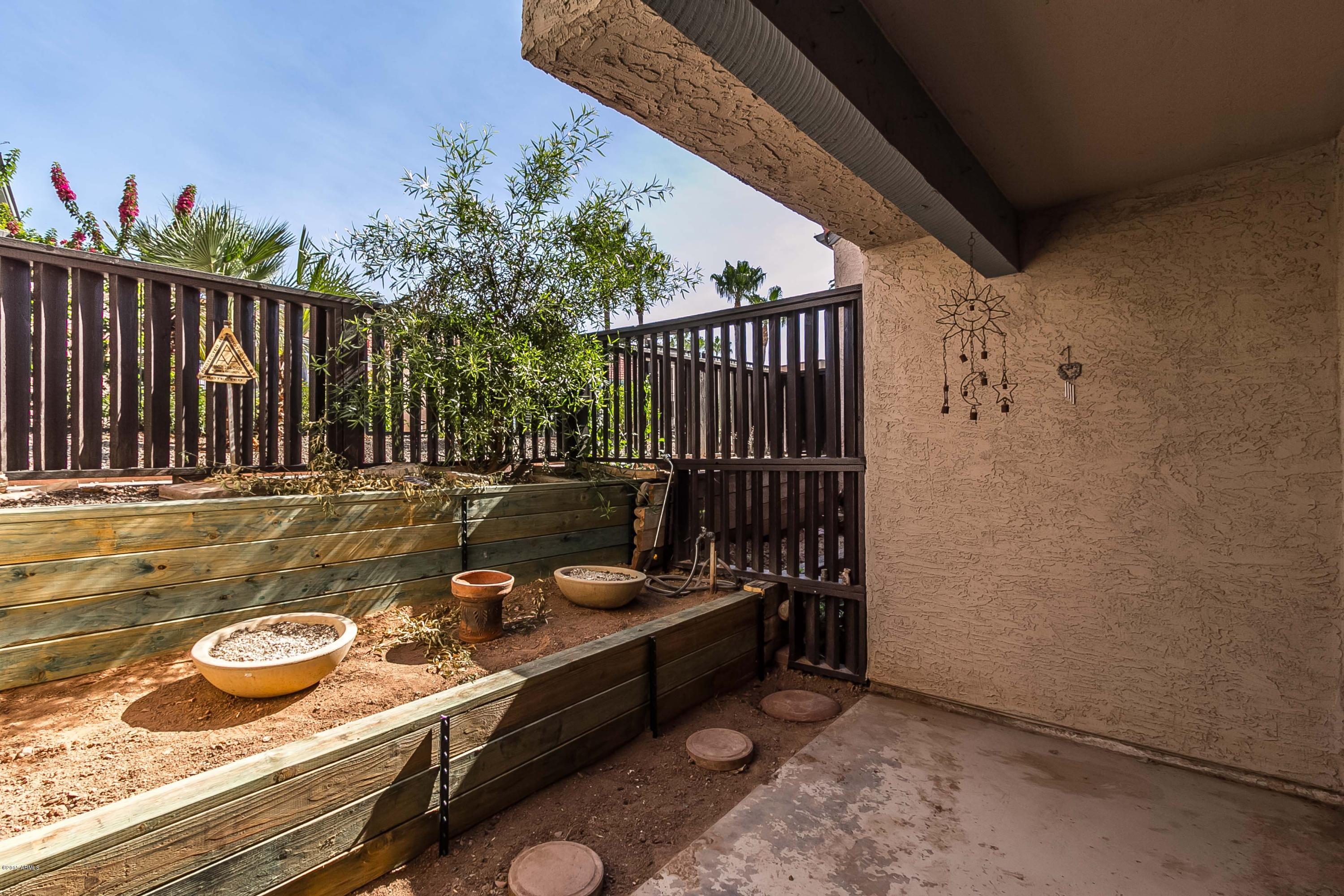 1645 West Baseline Road, Unit 1160 Mesa, AZ 85202 - Photo 24 of 27 a view of outdoor space with seating area