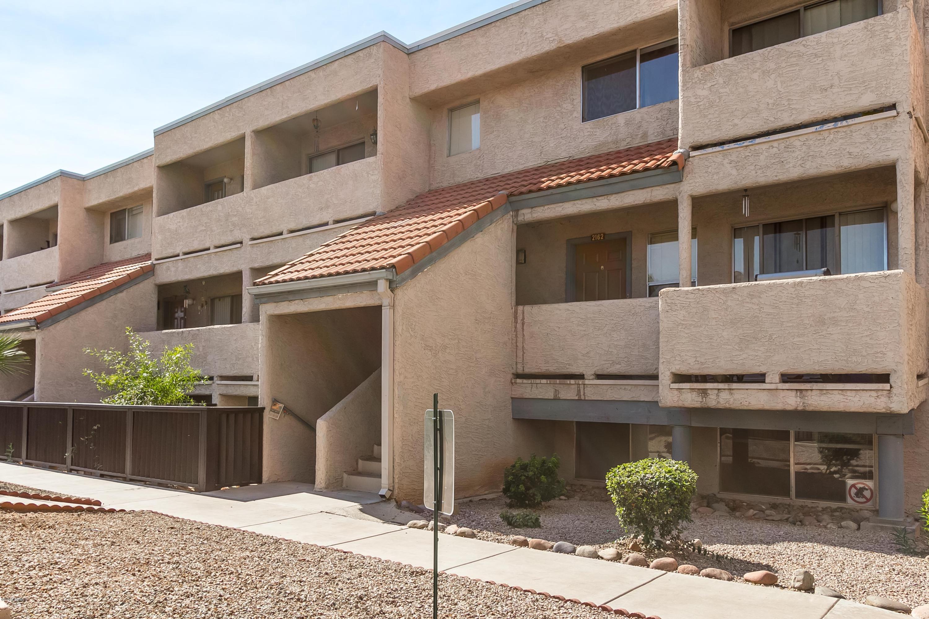1645 West Baseline Road, Unit 1160 Mesa, AZ 85202 - Photo 3 of 27 a front view of a house
