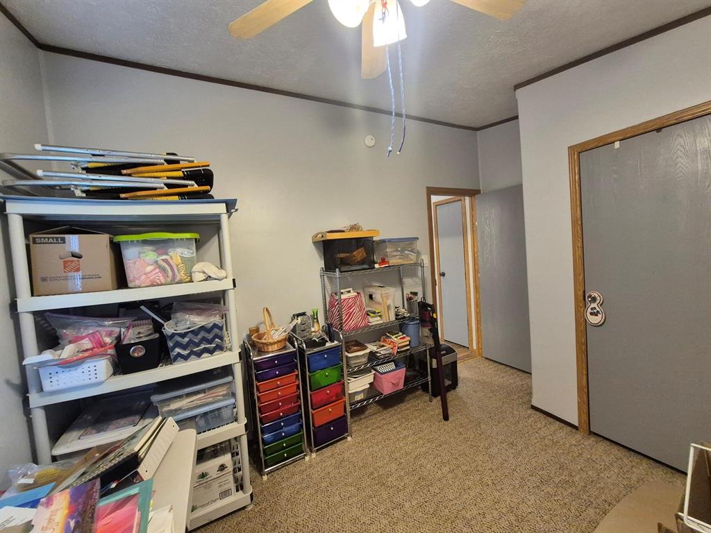 438 Silver River Road Gholson, TX 76705 - Photo 29 of 39 a room with storage and utility