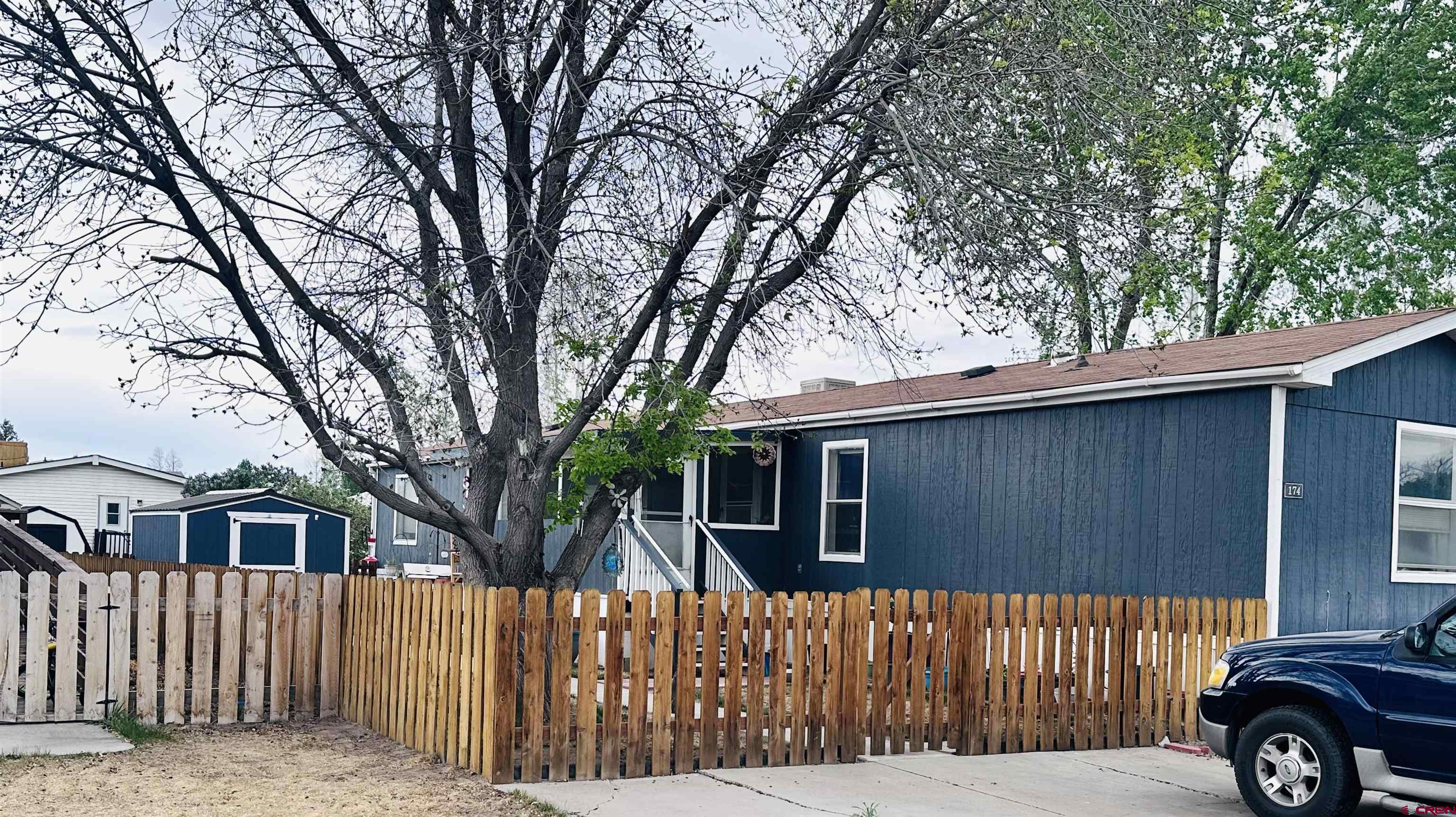 a front view of a house with a garage