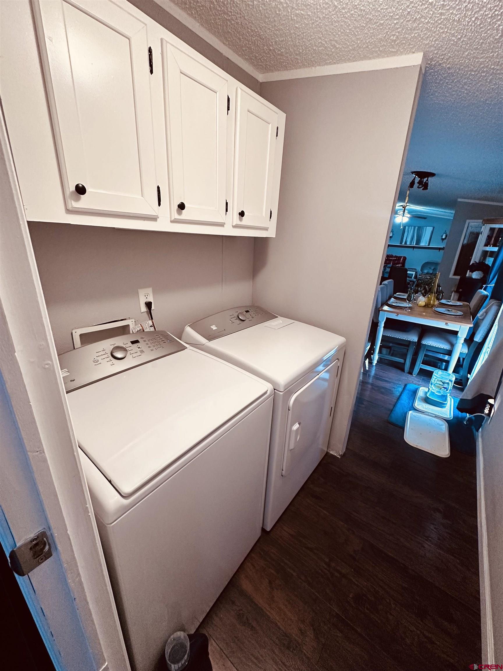 62880 Lasalle Road, Unit 174 Montrose, CO 81401 - Photo 15 of 23 a utility room with dryer and washer