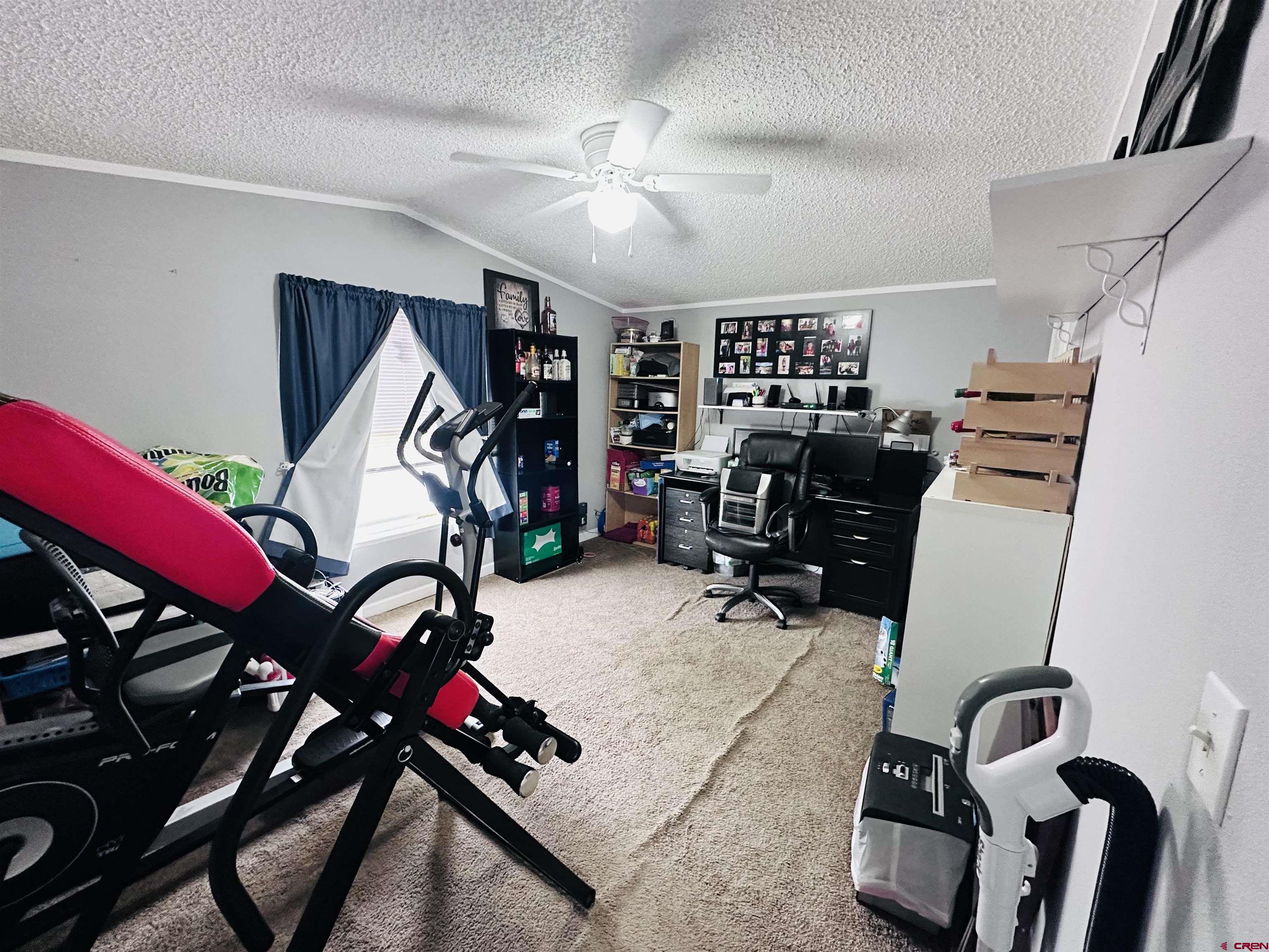 62880 Lasalle Road, Unit 174 Montrose, CO 81401 - Photo 21 of 23 a view of a room with gym equipment