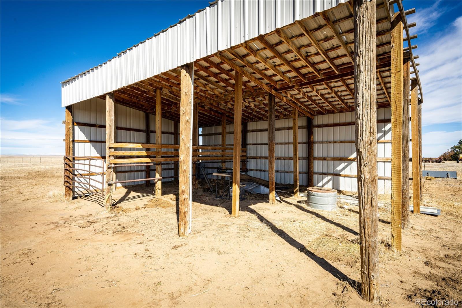 3955 South Behrens Road Byers, CO 80103 - Photo 26 of 32 a view of roof