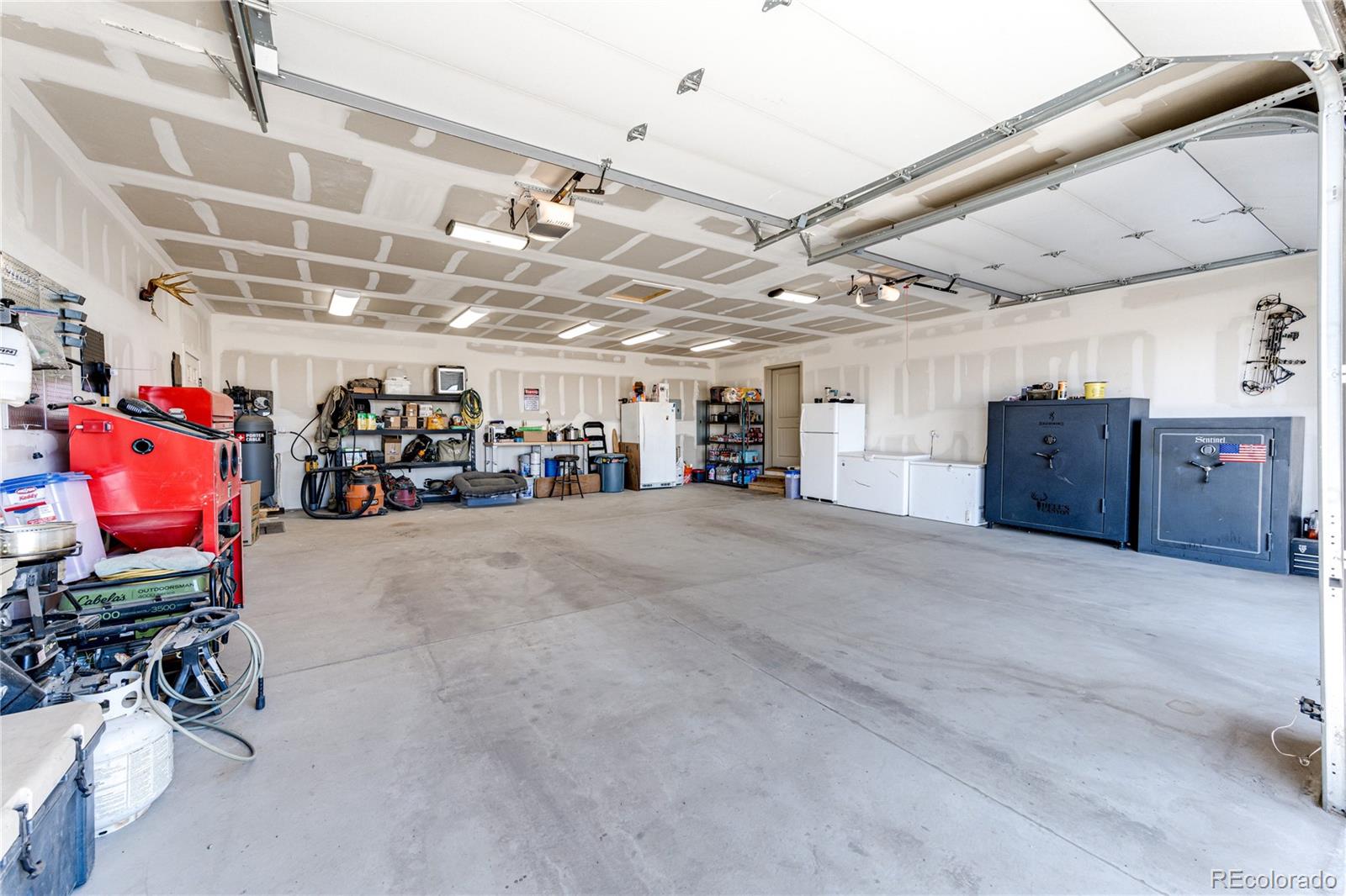 3955 South Behrens Road Byers, CO 80103 - Photo 27 of 32 a view of storage and utility room