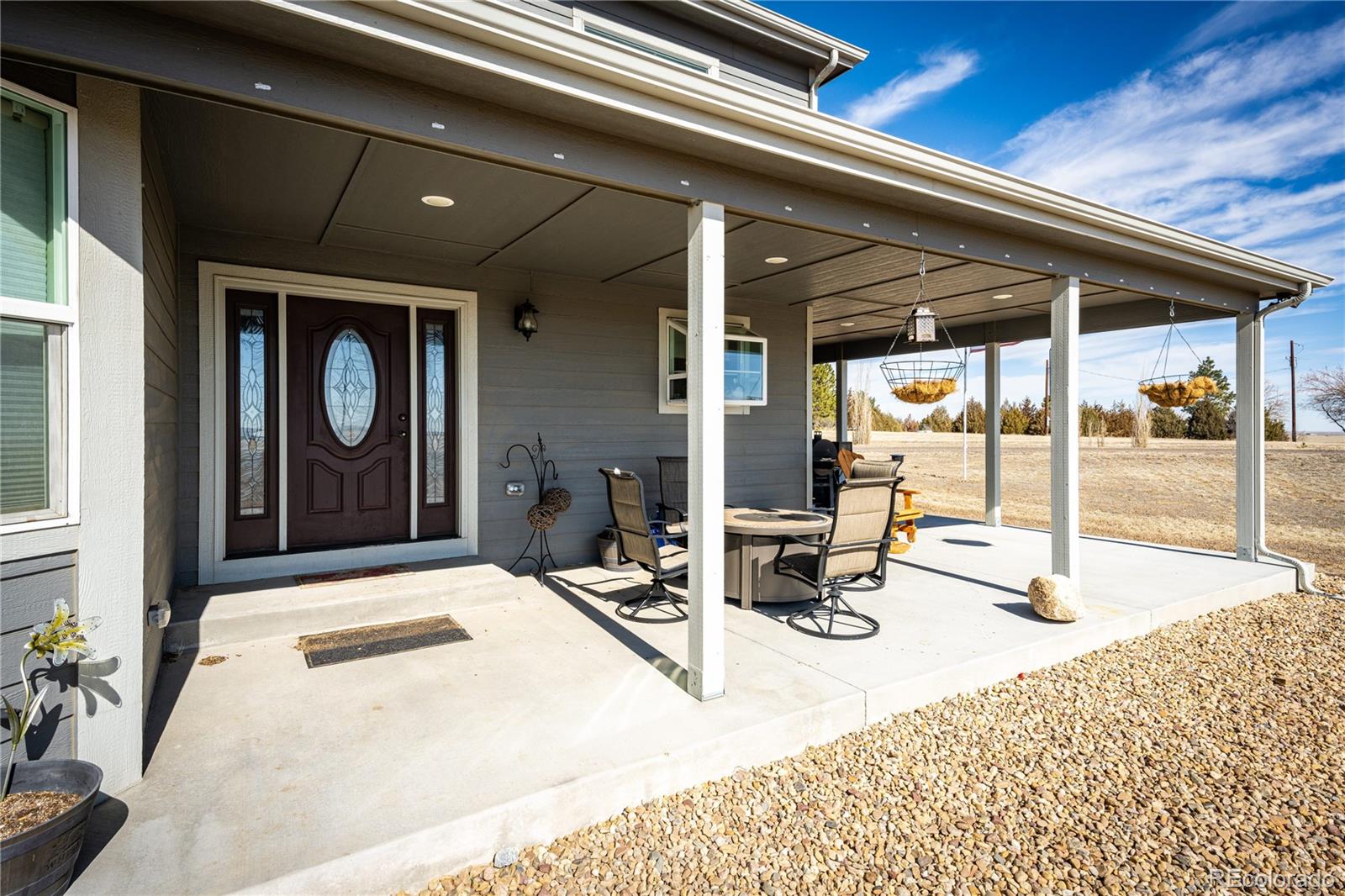 3955 South Behrens Road Byers, CO 80103 - Photo 3 of 32 a view of a entryway front of a house