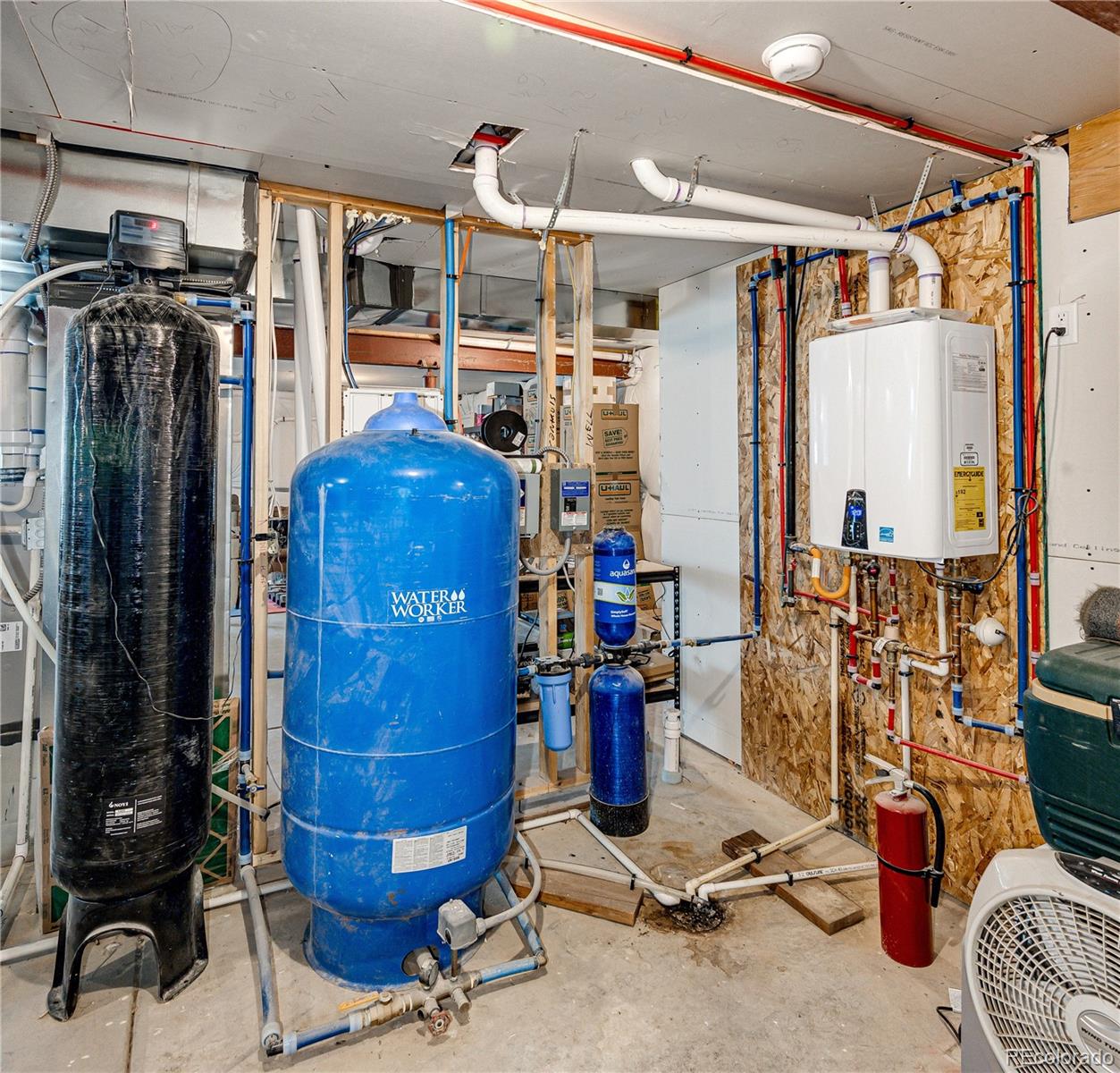 3955 South Behrens Road Byers, CO 80103 - Photo 31 of 32 a view of a storage room with a lot of stuff