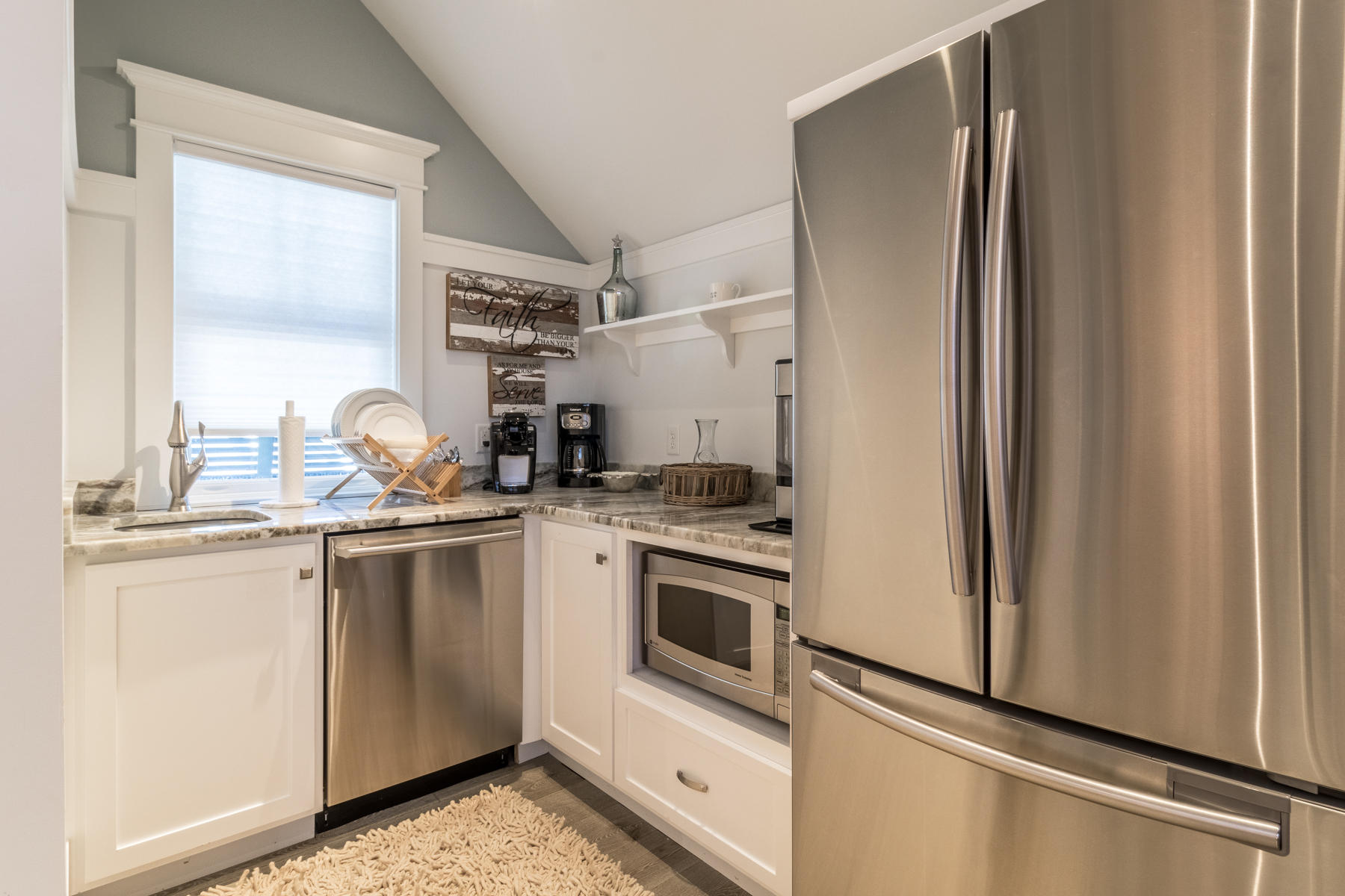 52 North Shingle Way Inlet Beach, FL 32461 - Photo 33 of 49 a kitchen with stainless steel appliances granite countertop a refrigerator and a sink