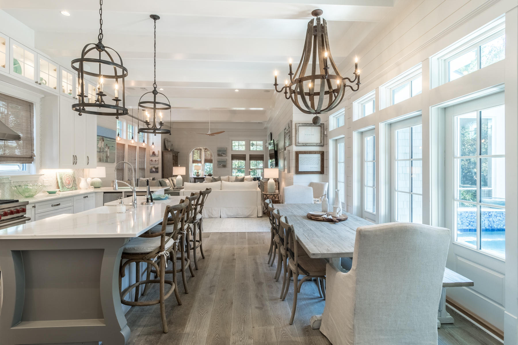 52 North Shingle Way Inlet Beach, FL 32461 - Photo 4 of 49 a view of a dining room and livingroom with furniture wooden floor a chandelier